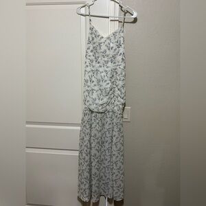 White dress with blue flowers